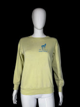 Load image into Gallery viewer, Light yellow sweatshirt on a mannequin with a logo against a plain background