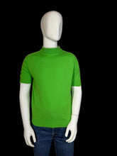 Load image into Gallery viewer, Mannequin wearing a green knit shirt and blue jeans on a white background