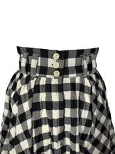 Load image into Gallery viewer, Black and white checkered skirt with button details on a plain background