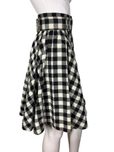 Load image into Gallery viewer, Black and white checkered skirt on a mannequin against a neutral background