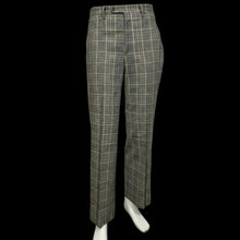 Load image into Gallery viewer, Plaid pants on a white rack against a plain wall.