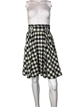 Load image into Gallery viewer, Mannequin wearing a black and white checkered skirt against a plain background