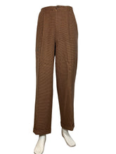 Load image into Gallery viewer, Brown pants displayed on a mannequin against a white wall.