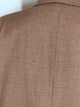 Load image into Gallery viewer, Close-up of moth hole on the back of the jacket