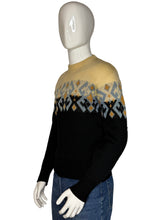 Load image into Gallery viewer, Mannequin wearing a black sweater with patterned cuffs on a plain background