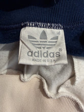 Load image into Gallery viewer, Close-up of an Adidas label on a garment