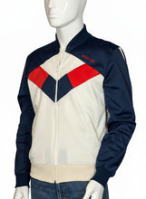 Load image into Gallery viewer, Navy, red, and white jacket on a mannequin against a gray background
