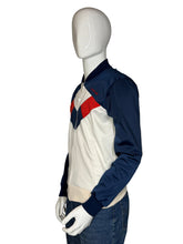 Load image into Gallery viewer, Mannequin wearing a navy jacket with red and white accents on a plain background