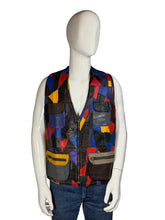 Load image into Gallery viewer, A mannequin wearing a colorful patchwork vest against a white background.