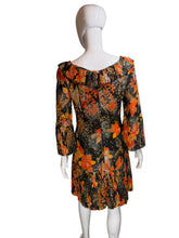 Load image into Gallery viewer, Black and orange floral dress on a mannequin against a white wall.
