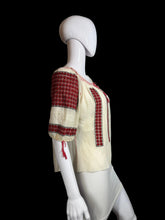Load image into Gallery viewer, White peasant blouse with red accents on a mannequin against a white background
