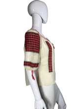 Load image into Gallery viewer, White peasant blouse with red accents on a mannequin against a white background