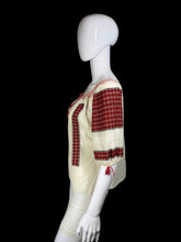 Load image into Gallery viewer, White peasant blouse with red accents on a mannequin against a white background