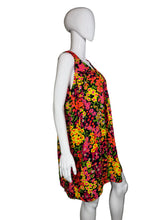 Load image into Gallery viewer, Mannequin wearing a colorful floral dress against a plain background