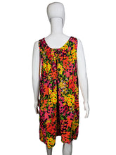 Load image into Gallery viewer, Colorful floral-patterned garment on a white mannequin against a neutral background