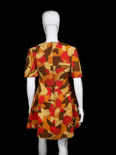Load image into Gallery viewer, Patterned fabric on a mannequin against a white background