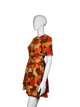 Load image into Gallery viewer, Mannequin wearing a colorful patterned dress against a plain background