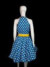 Load image into Gallery viewer, Mannequin wearing a blue dress with white polka dots and a yellow belt against a plain background