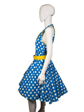 Load image into Gallery viewer, Mannequin wearing a blue dress with white polka dots and a yellow belt against a plain background