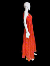 Load image into Gallery viewer, Pink and orange chiffon dress on a mannequin against a white background.