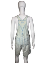 Load image into Gallery viewer, Light blue denim overalls on a mannequin against a white background