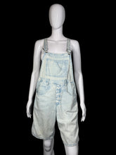 Load image into Gallery viewer, Mannequin wearing light blue denim overalls on a plain background