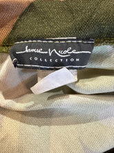 Load image into Gallery viewer, Close-up of a label on a piece of fabric with 'Jamie Nicole Collection' text.