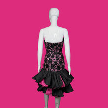 Load image into Gallery viewer, A mannequin wearing a black sequin and lace cocktail dress against a white background.