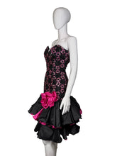 Load image into Gallery viewer, A mannequin wearing a black sequin and lace cocktail dress against a white background.