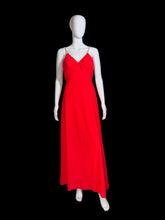 Load image into Gallery viewer, Mannequin wearing a red dress against a white wall.