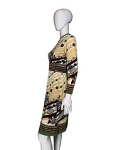 Load image into Gallery viewer, A patterned vintage dress against a white background.