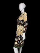 Load image into Gallery viewer, A patterned vintage dress against a white background.
