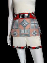 Load image into Gallery viewer, View showing the skirt flipped up to reveal the shorts underneath.