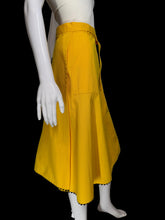 Load image into Gallery viewer, Yellow skirt with a white floral applique against a white background.