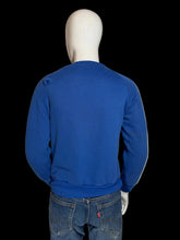 Load image into Gallery viewer, Blue swaetshirt on a mannequin against a white background.