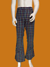 Load image into Gallery viewer, Plaid flared pants against a white background.