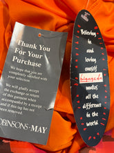 Load image into Gallery viewer, Black tag with text and a Robinsons-May receipt on an orange fabric background