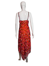 Load image into Gallery viewer, Mannequin wearing a red floral dress against a plain wall.