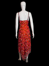 Load image into Gallery viewer, Mannequin wearing a red floral dress against a plain wall.