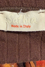 Load image into Gallery viewer, Textile tag with 'Sathia Made in Italy' label on a textured fabric background