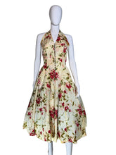 Load image into Gallery viewer, Floral dress on a mannequin against a plain background