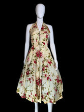 Load image into Gallery viewer, Floral dress on a mannequin against a plain background