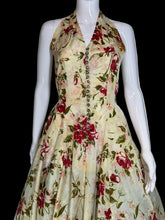 Load image into Gallery viewer, Floral dress on a mannequin against a plain background
