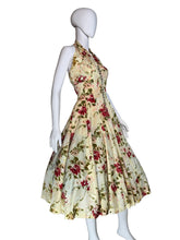Load image into Gallery viewer, Floral dress on a mannequin against a white background