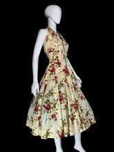 Load image into Gallery viewer, Floral dress on a mannequin against a white background