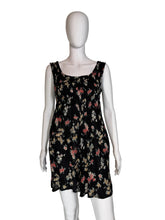 Load image into Gallery viewer, Floral dress on a mannequin against a plain background