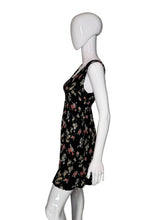 Load image into Gallery viewer, Mannequin wearing a black floral dress on a white background