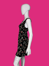Load image into Gallery viewer, Mannequin wearing a black floral dress on a white background
