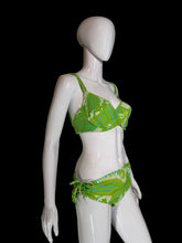 Load image into Gallery viewer, Mannequin wearing a green and white patterned bikini on a gray background