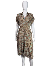 Load image into Gallery viewer, Floral dress on a mannequin against a plain background